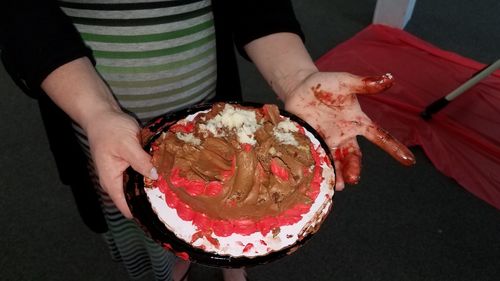 High angle view of woman preparing food on table