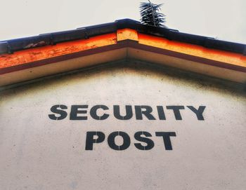 Low angle view of text on building