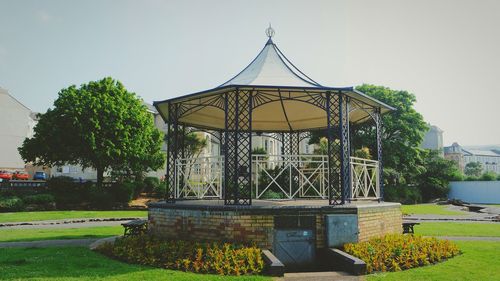 Gazebo in park against clear sky