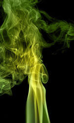 Close-up of smoke against black background