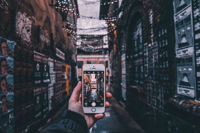 Close-up of man using mobile phone