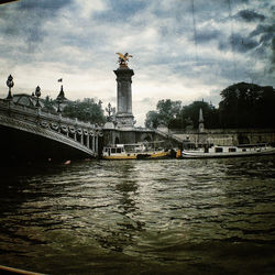 View of river against cloudy sky