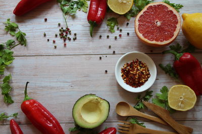 Directly above shot of fruits and vegetables on cutting board