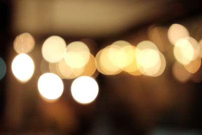 Defocused image of illuminated lights at night