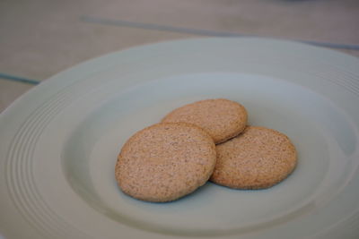 High angle view of cookies in plate