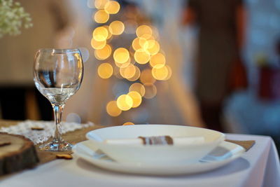 Close-up of wine in glass on table