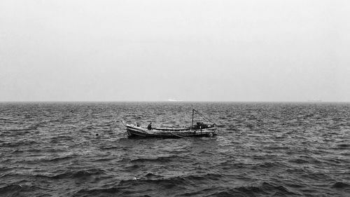 Boat sailing in sea