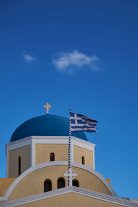 Low angle view of church against blue sky