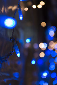 Close-up of illuminated blue string lights