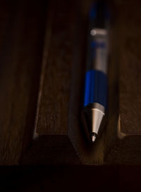 Close-up of pen on table