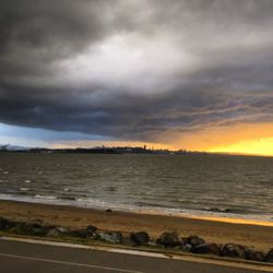 Scenic view of sea against sky at sunset