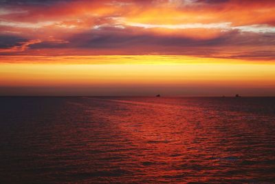 Scenic view of sea at sunset