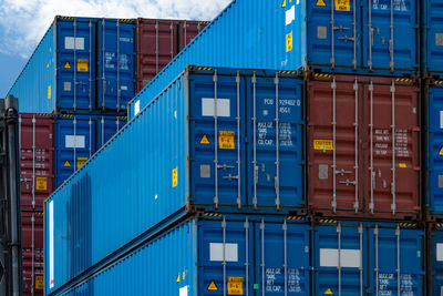 Close-up blue and red logistic container. cargo and shipping business. container ship for import 