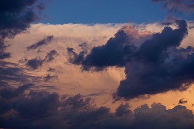 Low angle view of clouds in sky during sunset