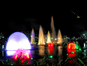 Illuminated city at night