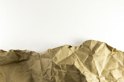 Close-up of garbage against white background