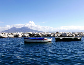 Scenic view of sea against blue sky