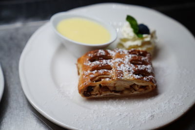 Close-up of breakfast served in plate on table