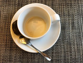 High angle view of coffee cup on table