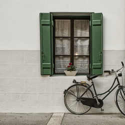 Bicycle against window