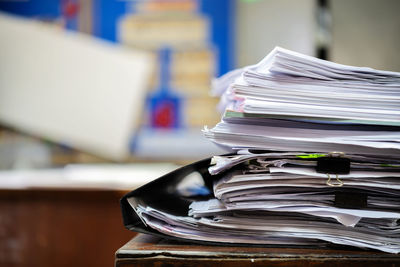 Close-up of stack on table