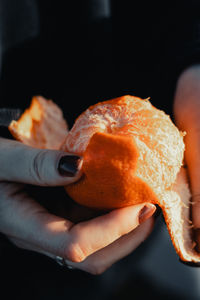 Close-up of hand holding ice cream
