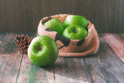 Green apples still life on the wood table