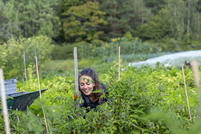 Woman on vegetable patch