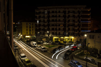 High angle view of traffic on city street at night