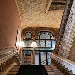 Low angle view of illuminated staircase in building