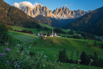 Scenic view of landscape and mountains against sky