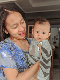 Portrait of mother and daughter