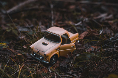 Close-up of toy car on field