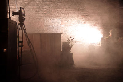 Shadow of man standing on wall