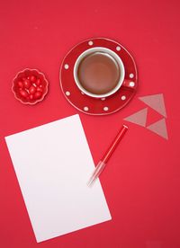 Directly above shot of coffee cup on table