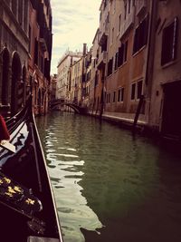 Boats moored in canal