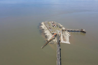 High angle view of wooden post in lake