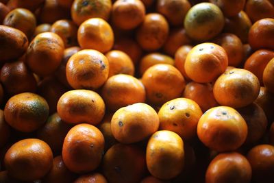 Full frame shot of oranges at market stall