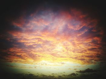 Scenic view of sea against sky at sunset