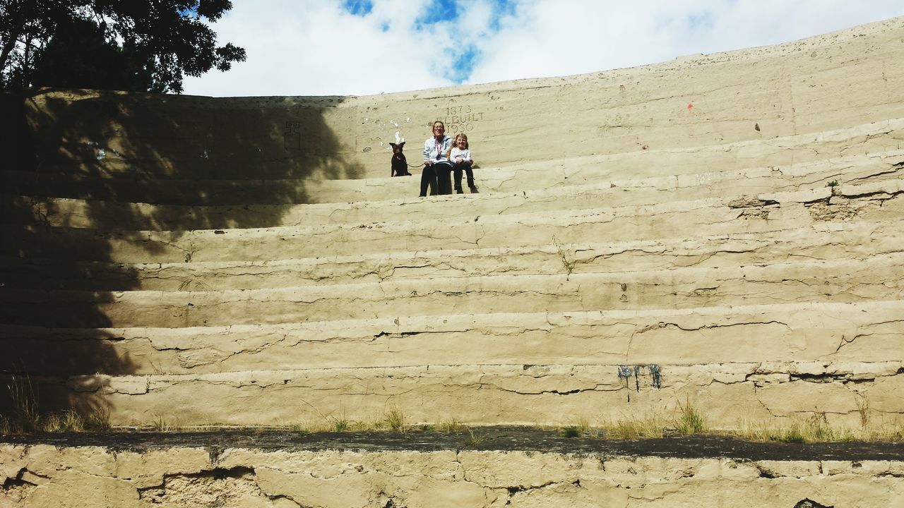 TOURISTS ON STEPS