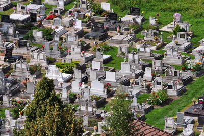 High angle view of tombstones at cemetery