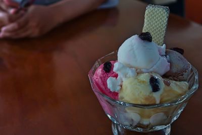 Close-up of ice cream in glass on table