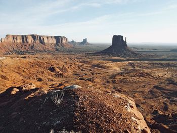 Rock formations on landscape against sky