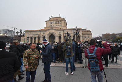 Group of people in front of building