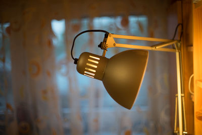 Close-up of illuminated lighting equipment