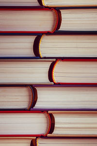 Background texture of old retro paper books stack - full frame shot of books 