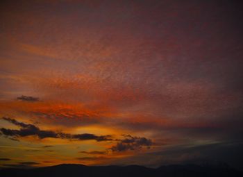 Low angle view of dramatic sky during sunset