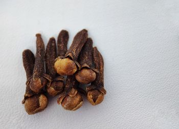 Close-up of coffee beans on table