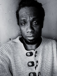 Close-up portrait of young man at home