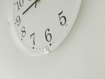 Close-up of clock on wall